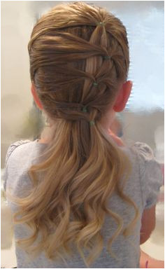 A Fancy Row of Ponytails Easy Hairstyles