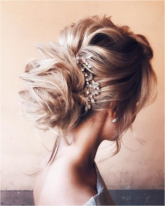 Elegant chic bun with volume on top mother of the bride hair wedding hairstyle ideas