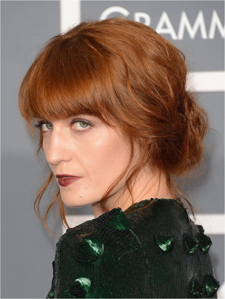 A fan of the full figured fringe Florence Welch wears bangs that cascade into a face frame making them much more versatile