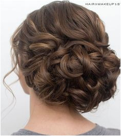 loose curls on the top wave into bun Classic Updo Hairstyles Classic Hair Updo