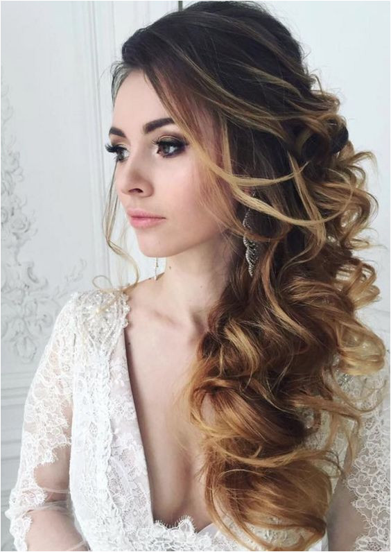 long wavy wedding hairstyle idea via Elstile