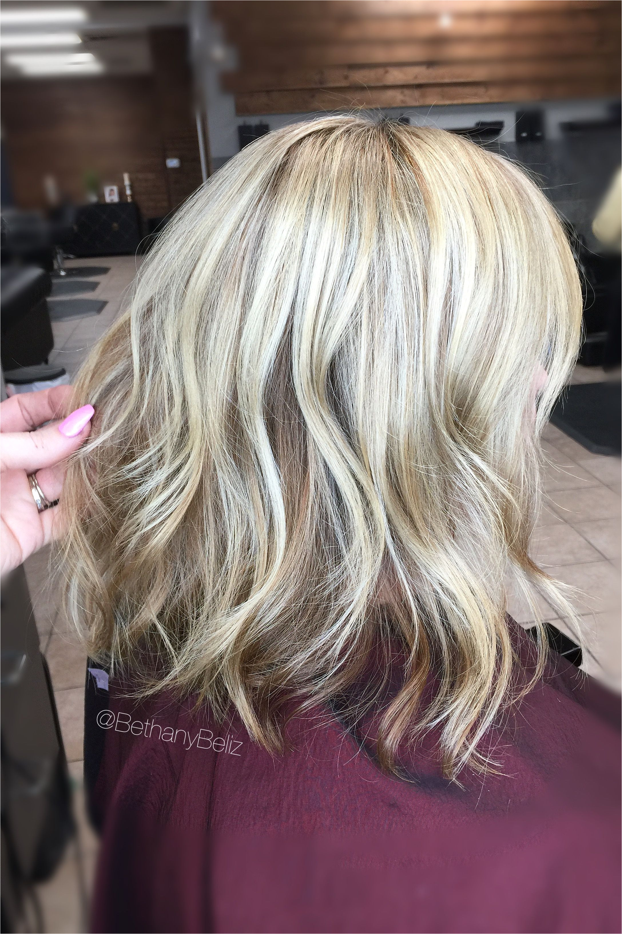 Caramel Color and blonde highlights with a lob Aline haircut