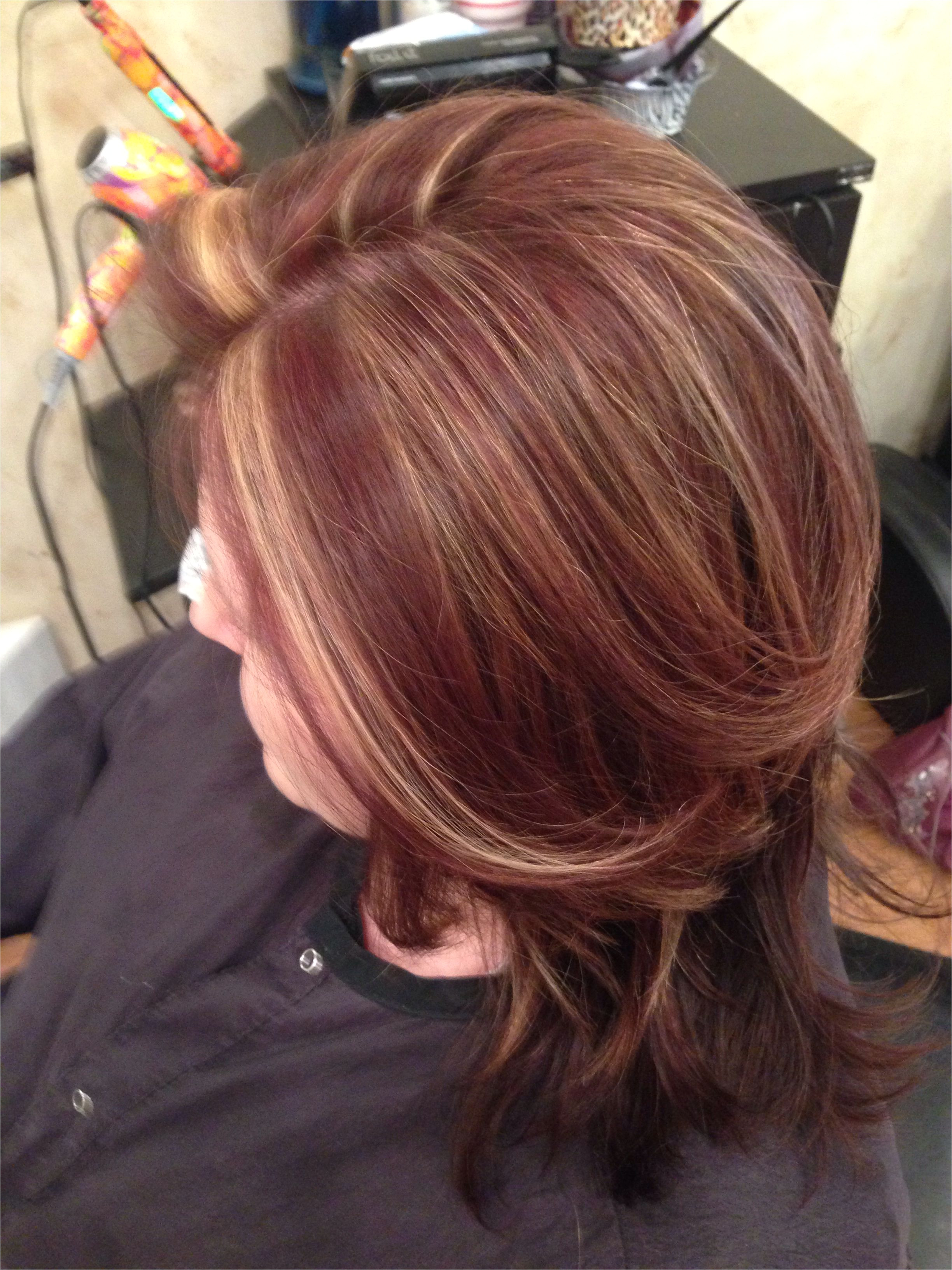 Warm blonde chunks with racing red and chocolate brown lowlights Red Brown Hair Chocolate Brown