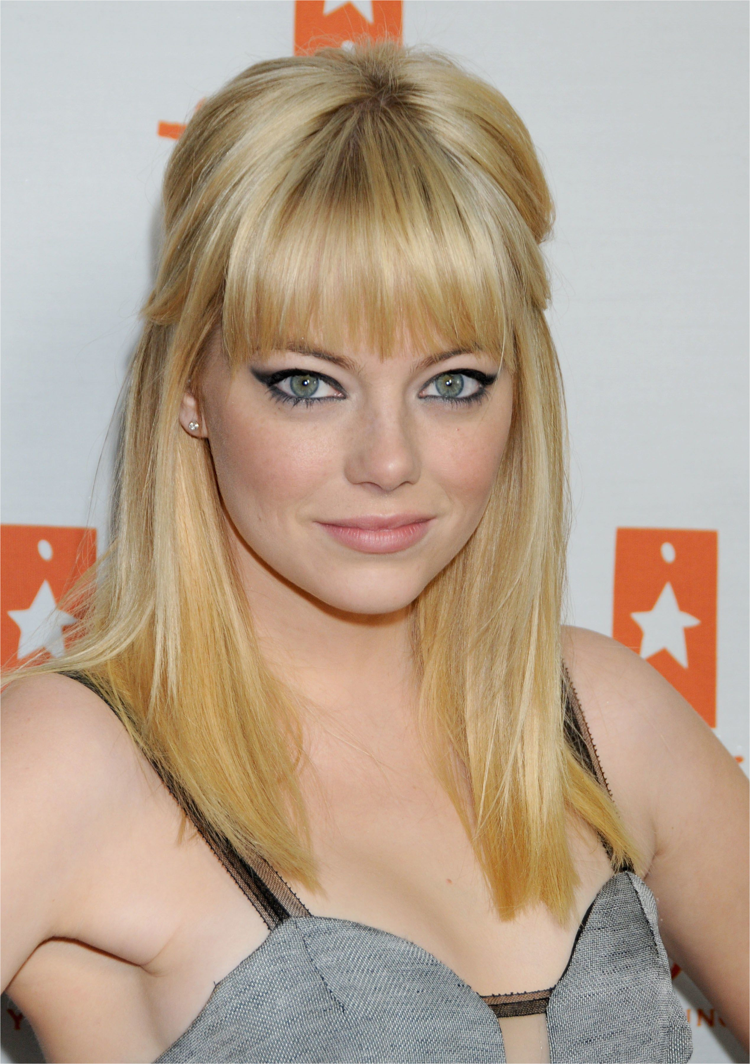 A Look Back at Emma Stone s Hair Evolution from Auburn in "La La Land" to Bleach Blonde Bangs s
