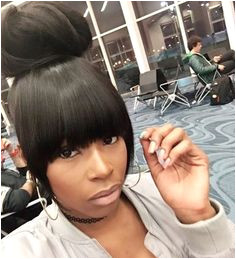 Jacque Monae on Instagram “Perfect top knot bun and heavy bangs I created rtinkf Hair by JacqueMonae Who s next JacqueMonae voiceofhair sewin