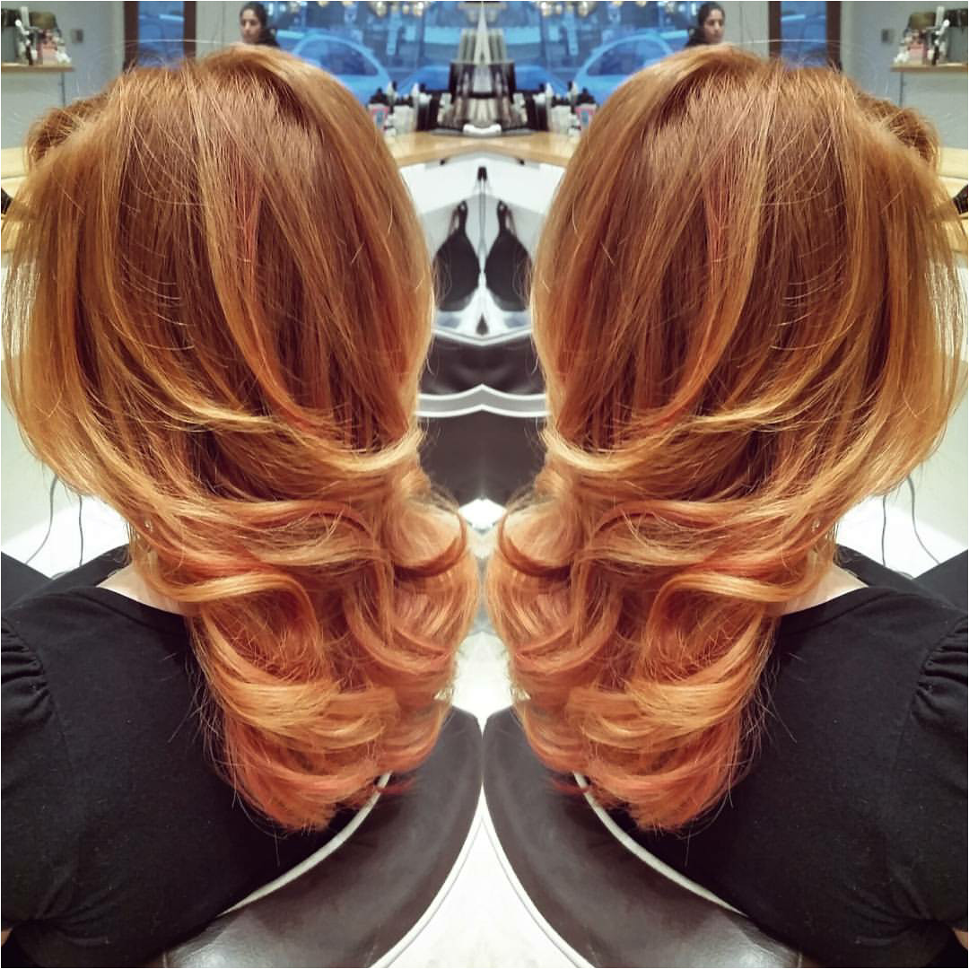 Blow out with curl on the bottom on gorgeous red gold hair Wavy blowout blow dry bouncy blowout style done at Blow Dry Westport by Annemarie