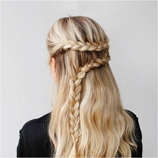 This half up braided do can dress up a casual outfit at work on a Monday or transition into an elegant and romantic evening look
