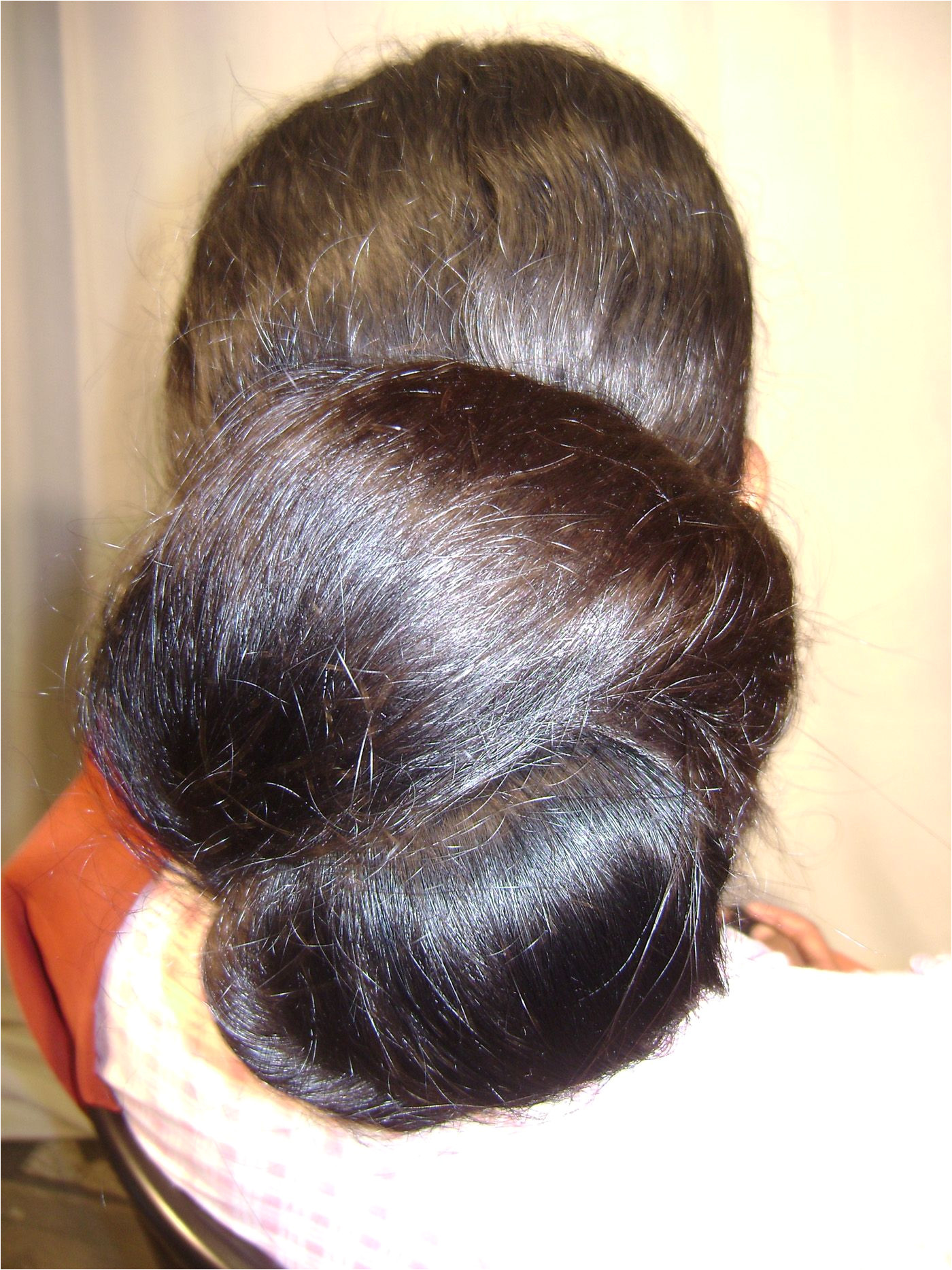 What a beautiful large low bun Care however should be taken before adopting such hairstyles as due to it s high static charge it will cause phlegm to