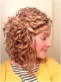 My curl patten with long stacked bob I like the warm caramel blonde color