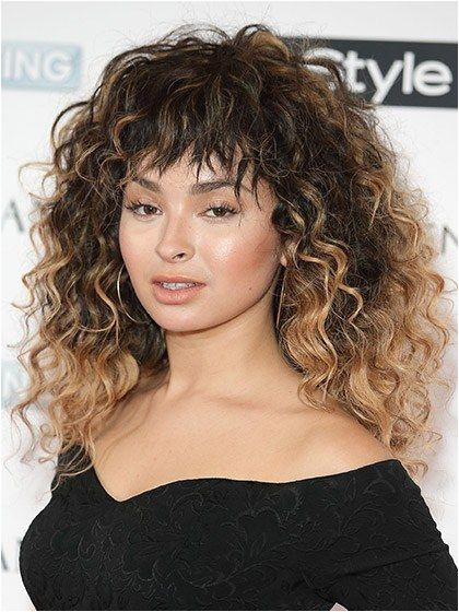 How to Style Curly Bangs Without Looking Like a Flashdance Reject