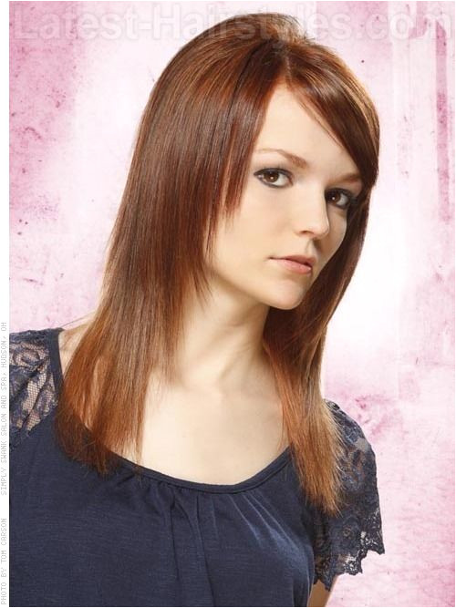 Tapered Straight Hair only layered in front with side swept bangs no layers in back increases body