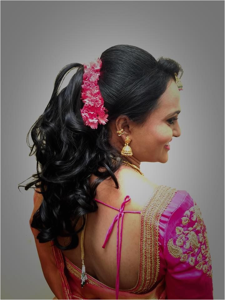 Indian bride s bridal reception hairstyle by Swank Studio Find us at s