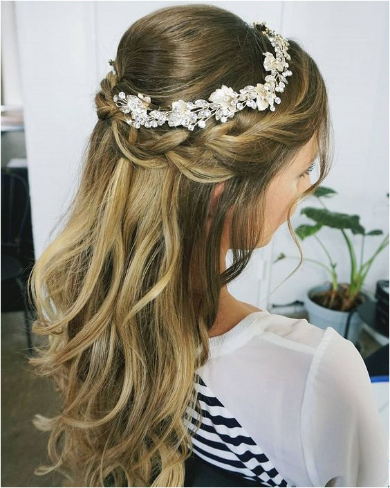 Half up half down wedding hairstyles partial updo bridal hairstyles a great options for the modern bride from flowy bohemian to clean contemporary