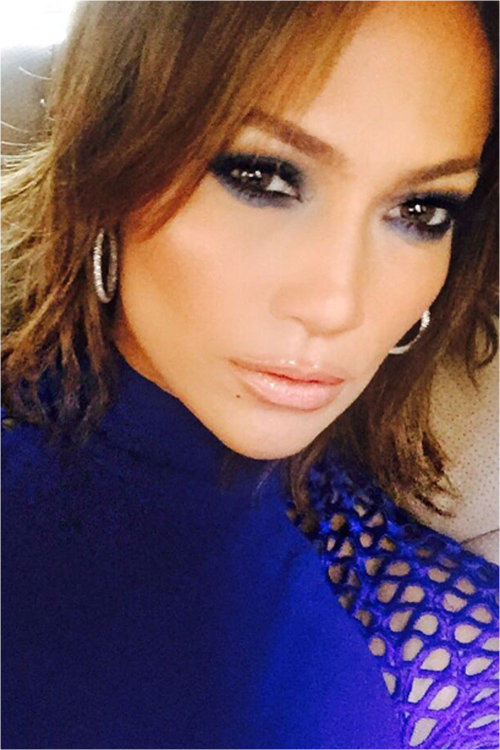 Jennifer Lopez goes even shorter with this new brown hair bob Thoughts
