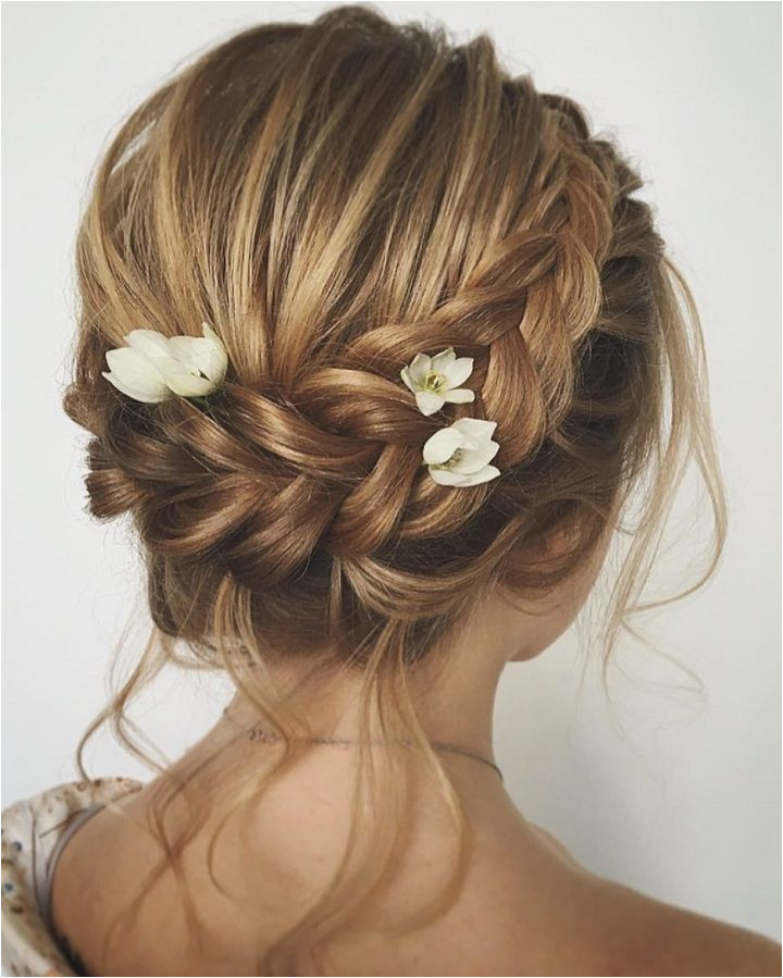 Unique updo with braid wedding hair inspiration