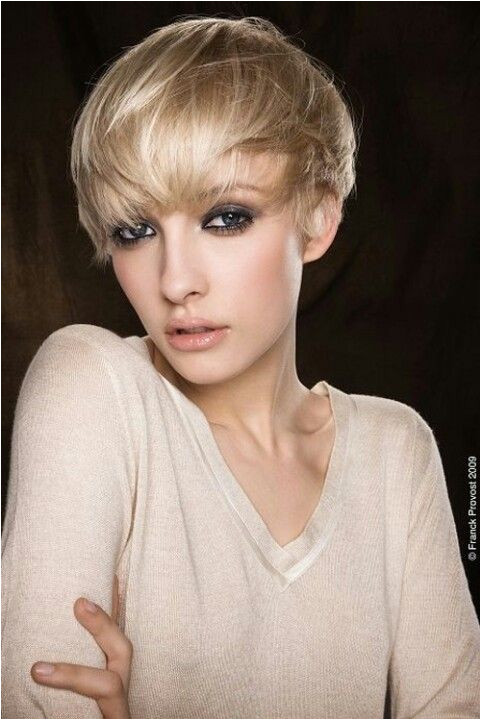 Short pretty dark blonde hair with highlights