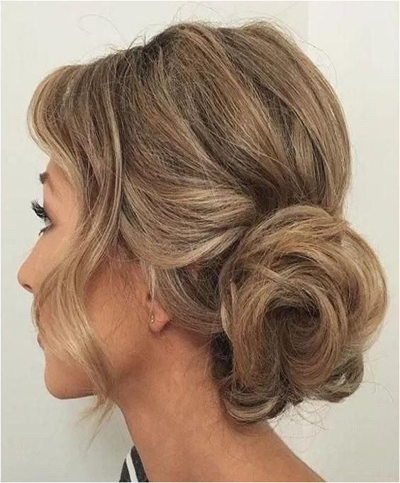 In 2018 Updo Side Bun Hairstyles is always on top and be in demand for formal events and also wedding occasion for bridals This is a cu…