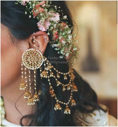 Floral crown and Statement earrings Mehendi look inspiration