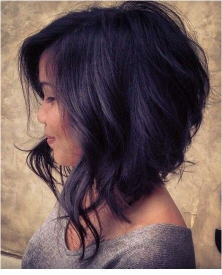 The layered locks Angled Bob Longer Angled Bob Long Front Bob Curly Asymmetrical Bob