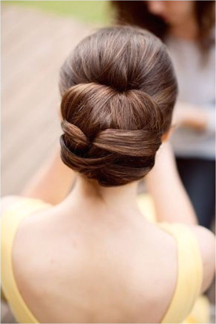 Neat and classic bun hairstyle idea for your wedding day For more inspiration visit