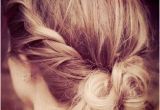 Fast Hairstyles after Shower Give the Messy Bun A Little Makeover by Twisting the Sides and