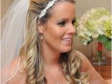 Half Up Bridal Hairstyles with Veil Wedding Hair Half Up with Flower and Veil Wedding Diary