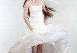 Wedding Hairstyles Real Brides Portrait Od A Bride with Long Dark Hair In Wedding Dress isolated